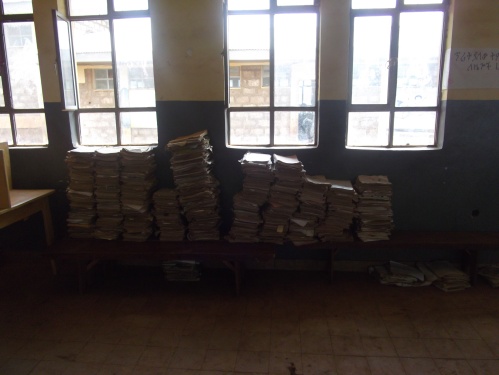 Books waiting for a shelf at one of the schools